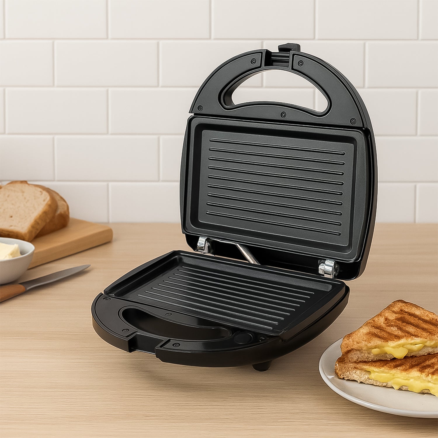 Orbit sandwich maker showing easy plate change feature for grilled sandwiches
