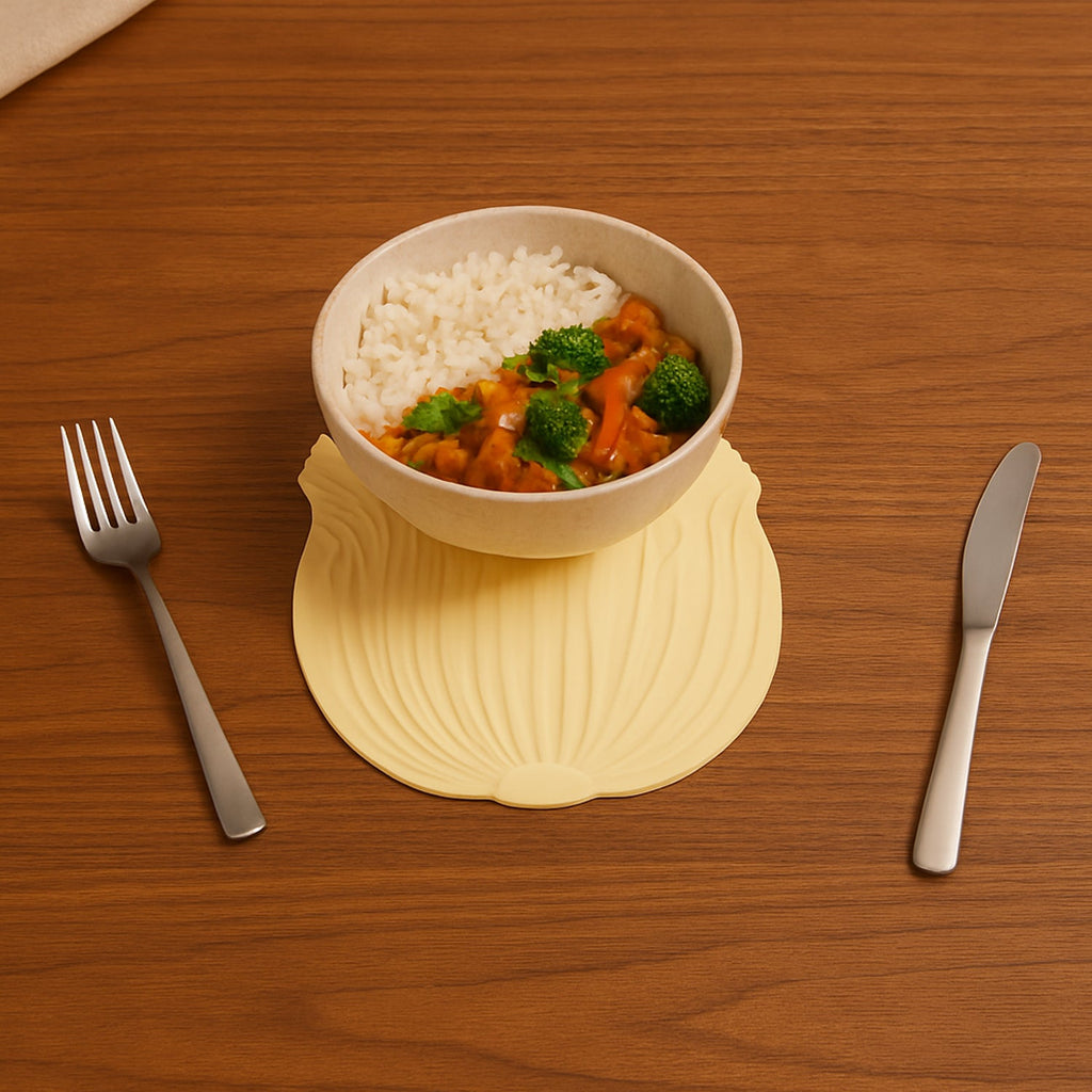 Close-up of a heat-resistant silicone leaf coaster with detailed embossed texture