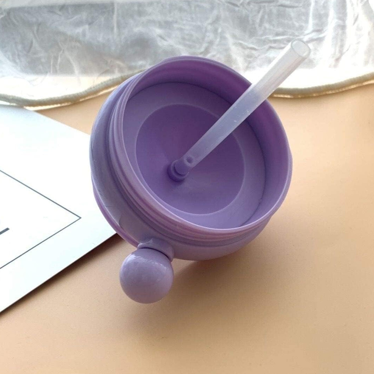 Multiple Whale Spray Sippy Cups in different colour variations, ready for playtime.
