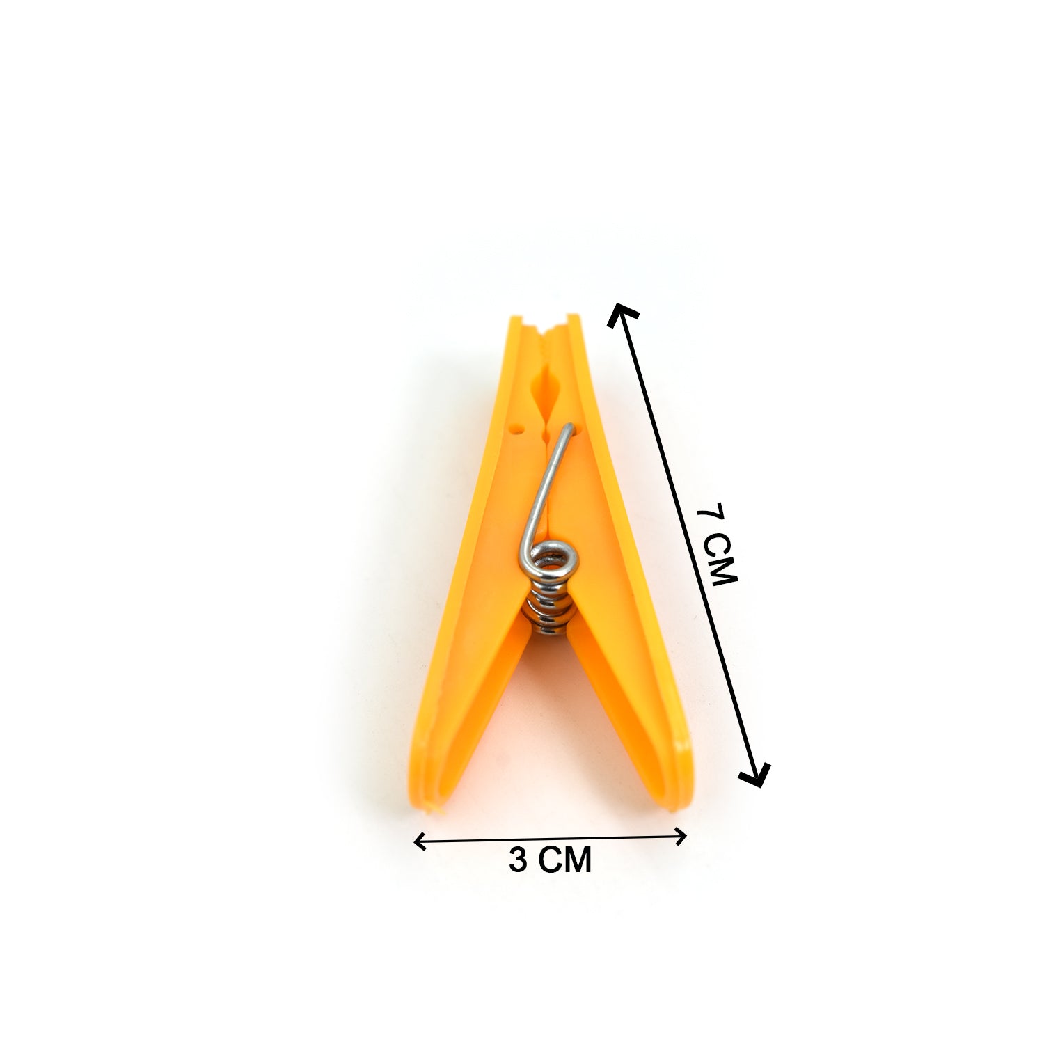 Hand holding a white cloth clip, demonstrating its ergonomic design.