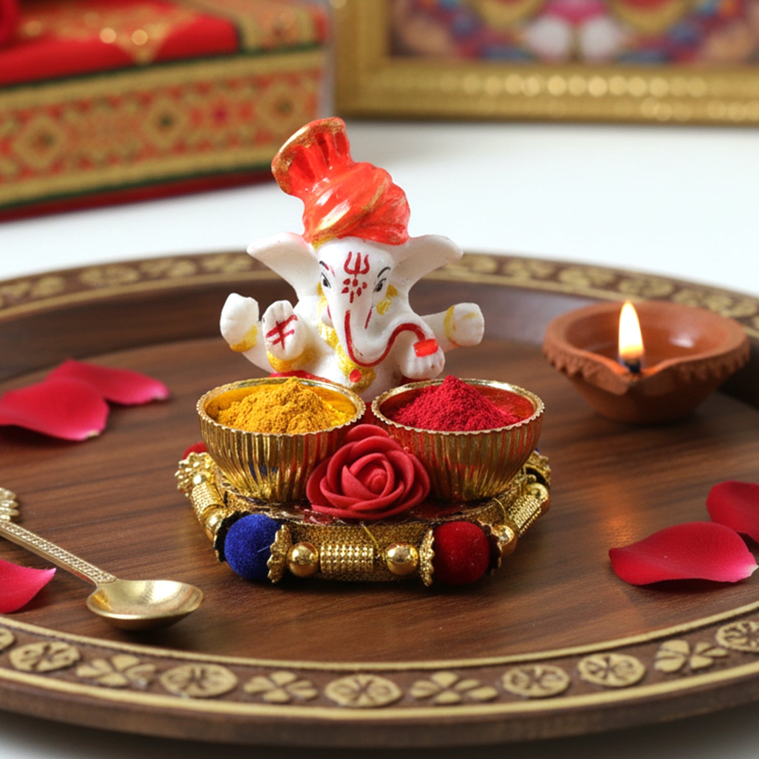 Ganesha worship thali with colorful festival decor