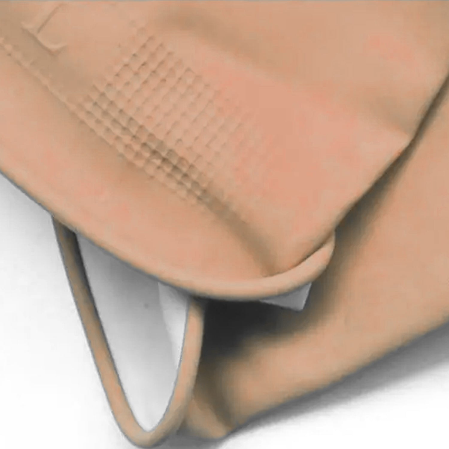 Hands wearing natural gum rubber cleaning gloves tackling tough stains.