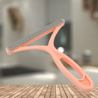 Durable hair remover with plastic and silicone edges for safe fabric care.