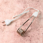Portable immersion heater rod showing its compact design for travel
