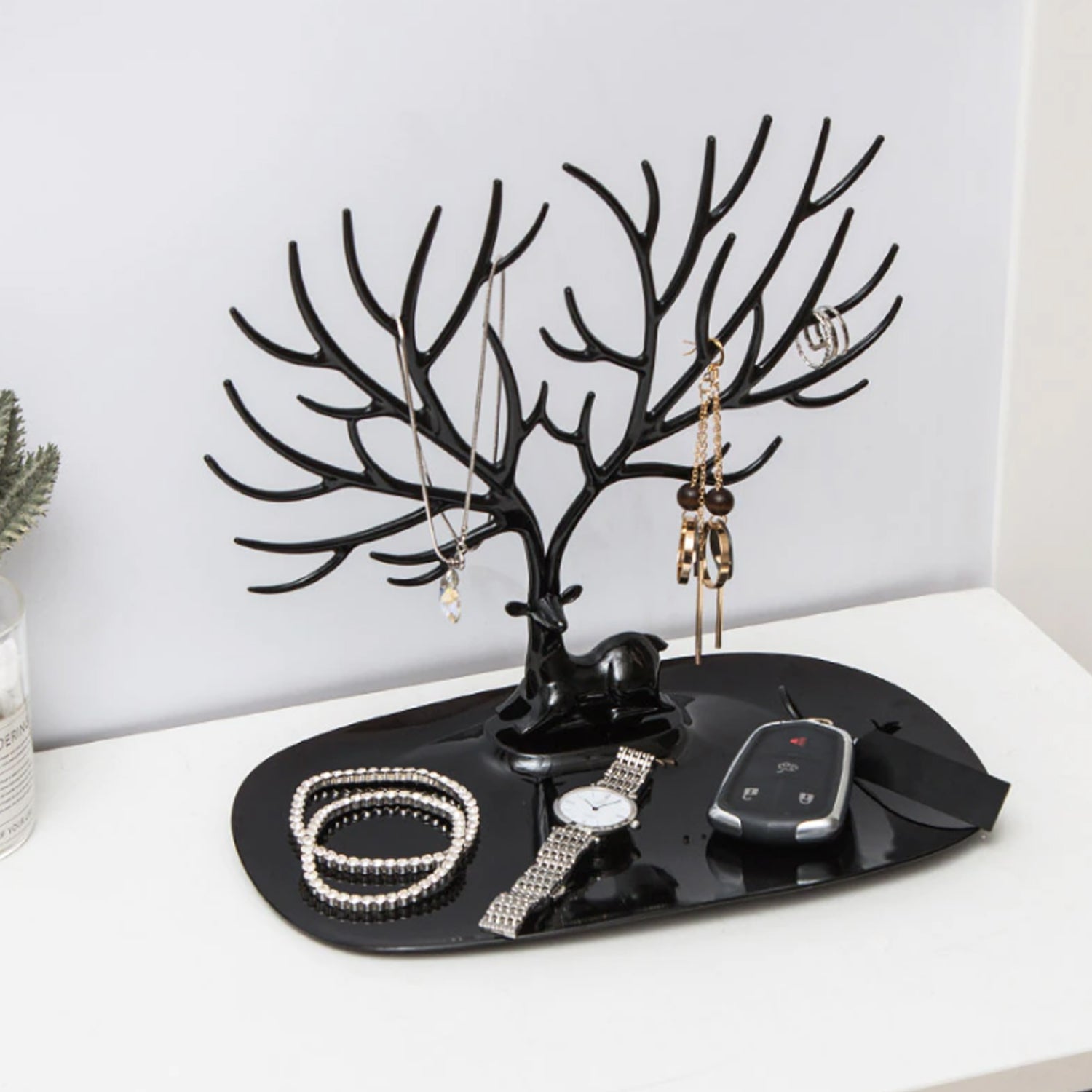 Top view of deer earring holder stand showing branches for accessories
