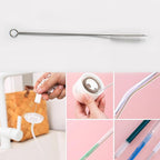 Close up of flexible wire and bristle head of straw cleaning tool