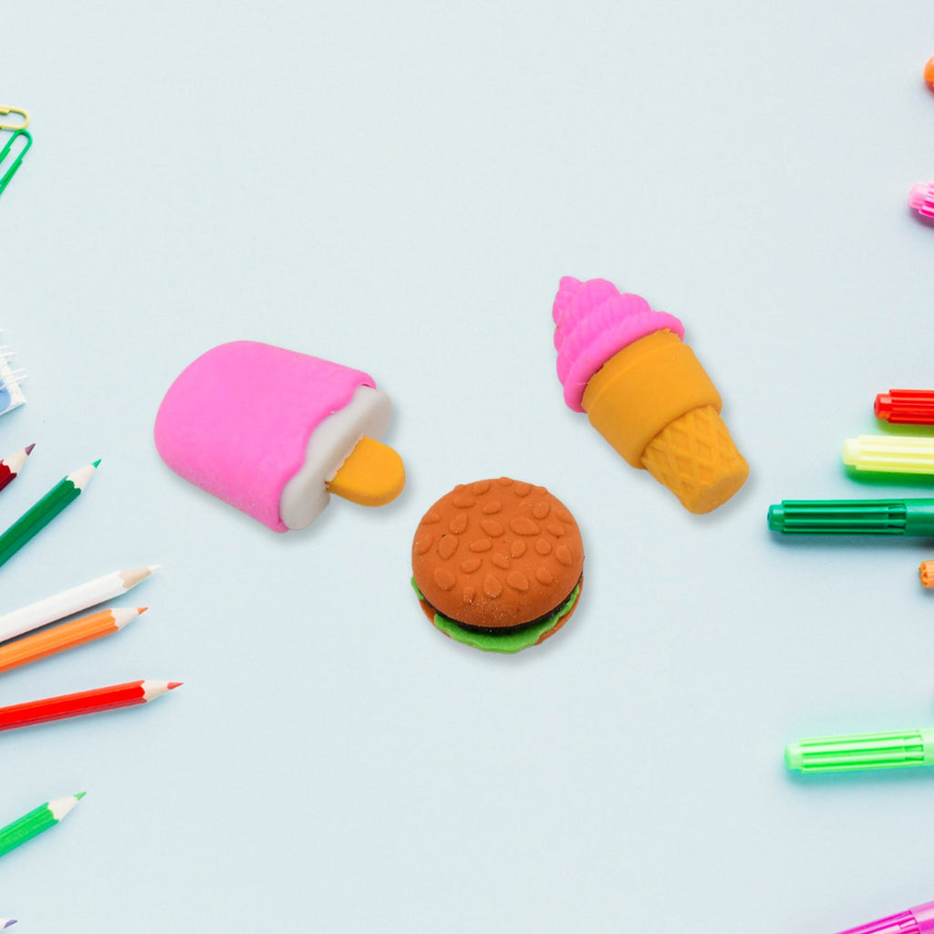 A collection of brightly coloured and uniquely shaped erasers for school children.