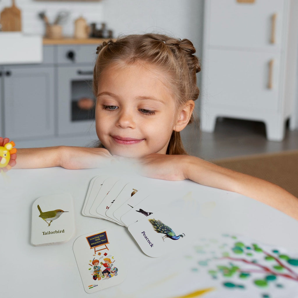 Close-up detail of early learner flashcards showing clear images and text