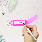 Writable label on clear keychain ID tag for identification
