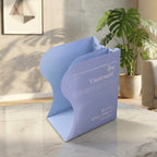 Portable adjustable bookend placed on a bookshelf