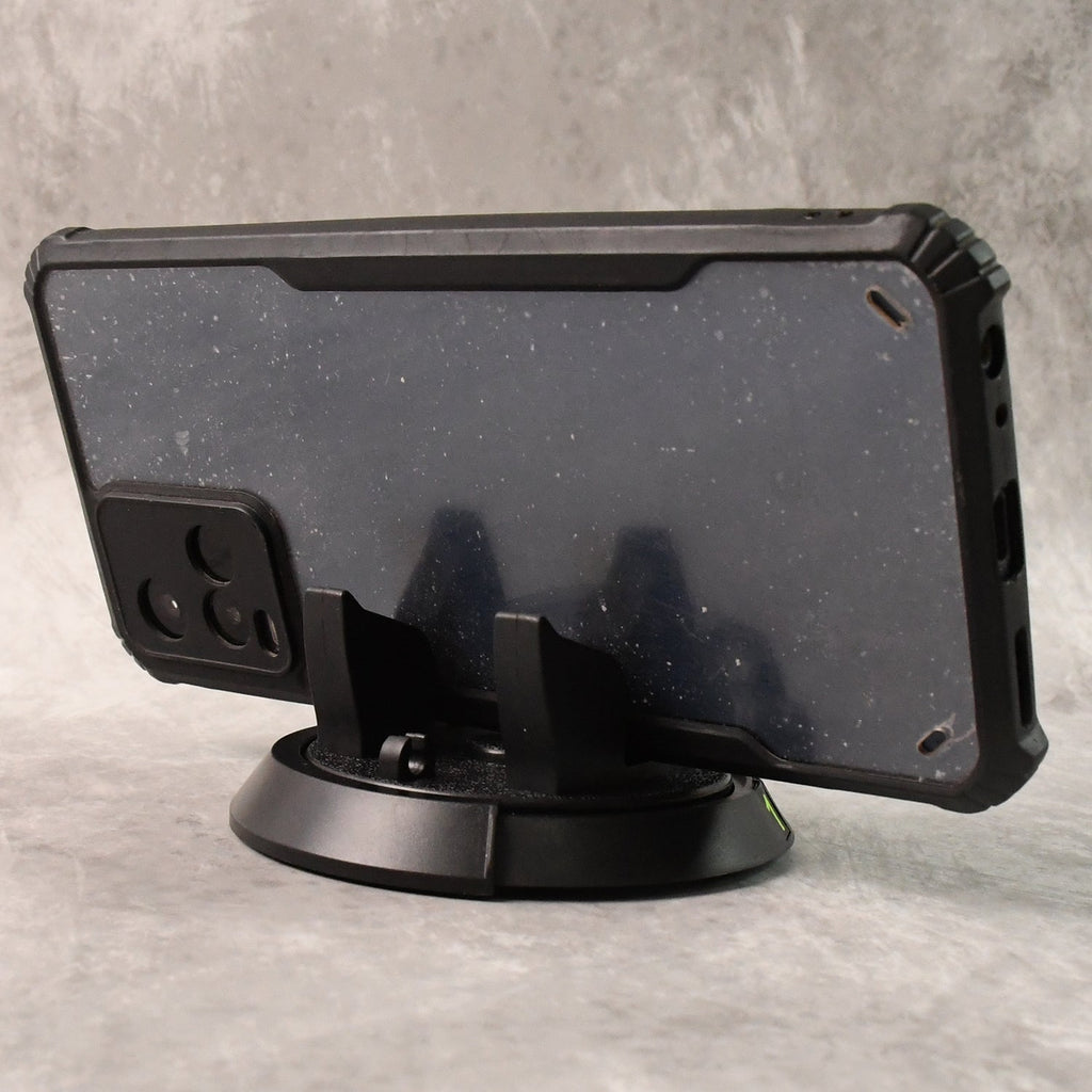 Car dashboard phone holder providing strong grip and stable support