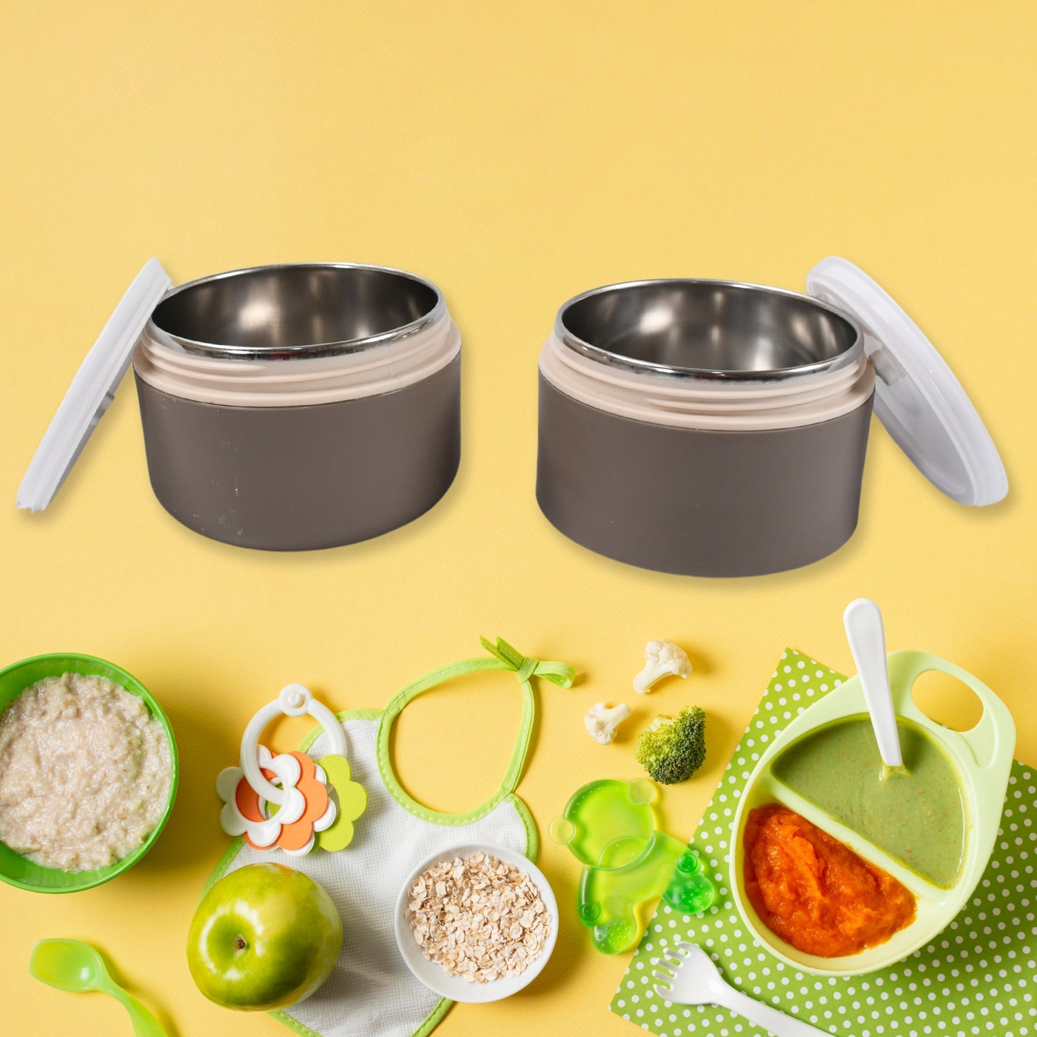 A collection of Ganesh stainless steel lunch boxes in various vibrant colors.