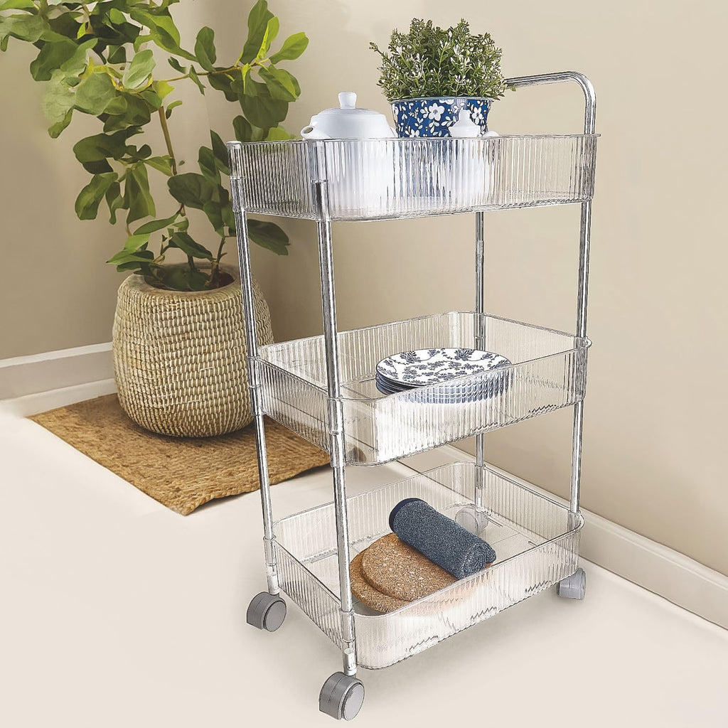 Close-up of transparent plastic baskets on 3-layer storage trolley