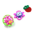 Three colorful baby rattle toy set pieces arranged for sensory play and infant development.