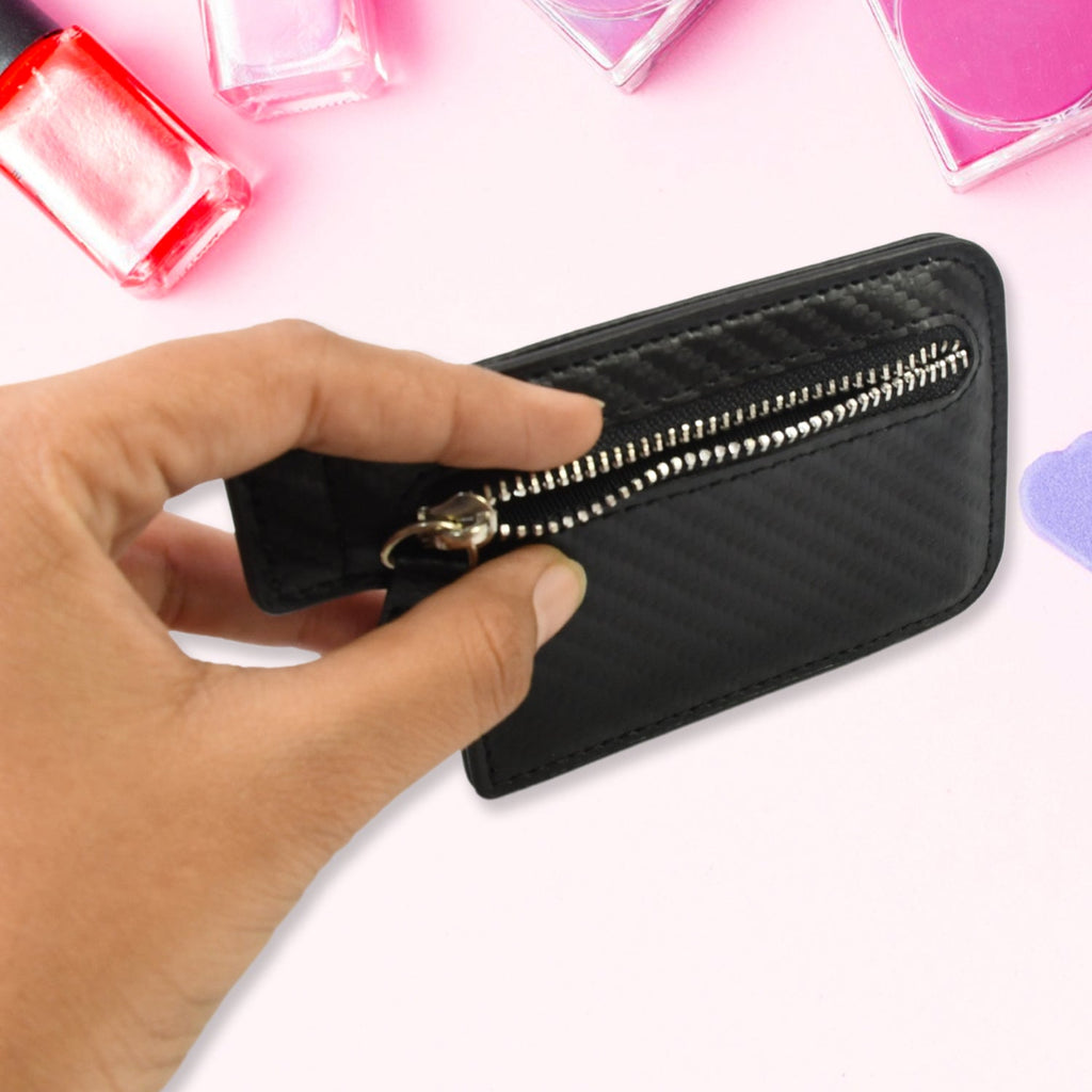 Multiple cards and Indian currency notes stored securely inside the black adhesive phone wallet.