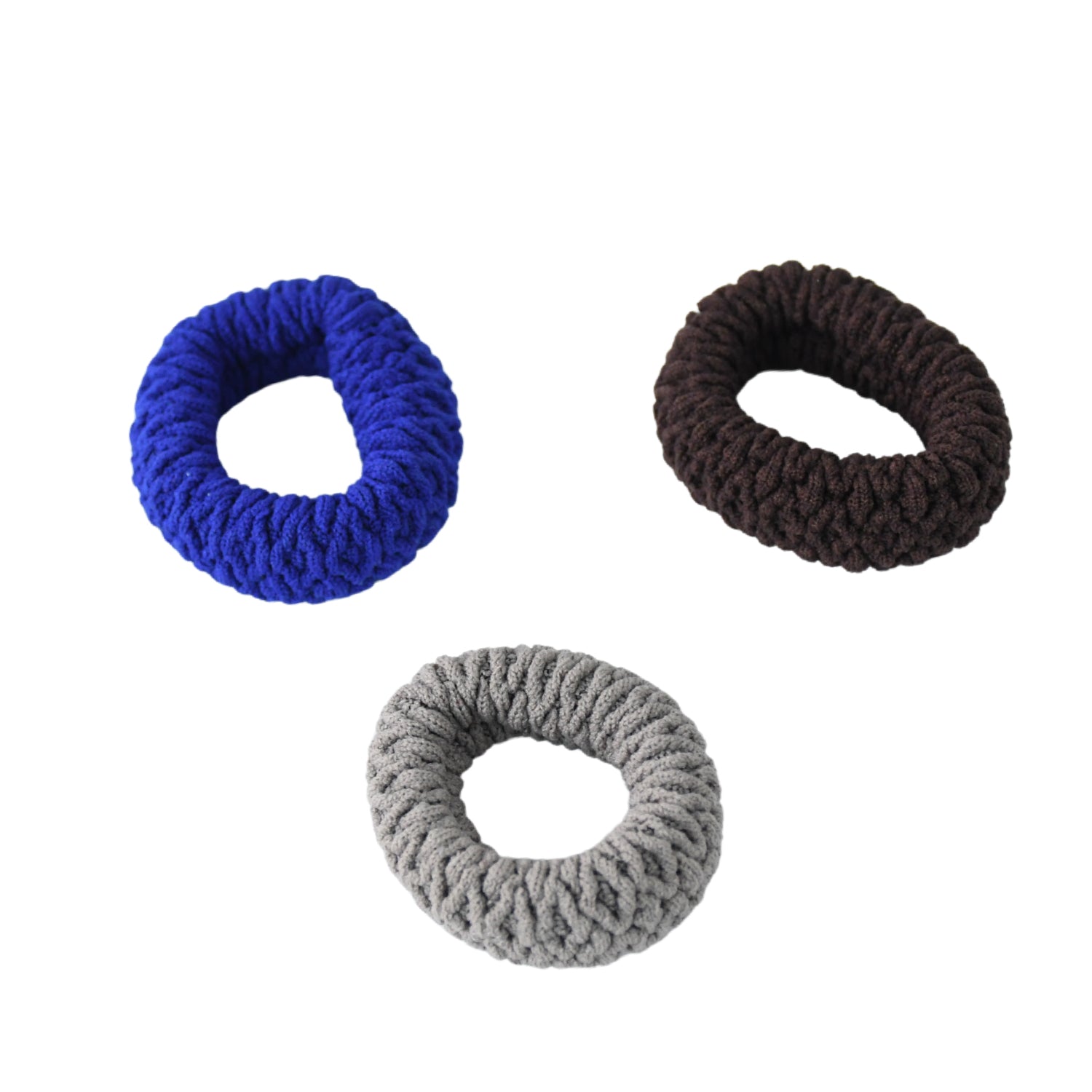 A widened tyre shape hair band securely holding a thick ponytail.