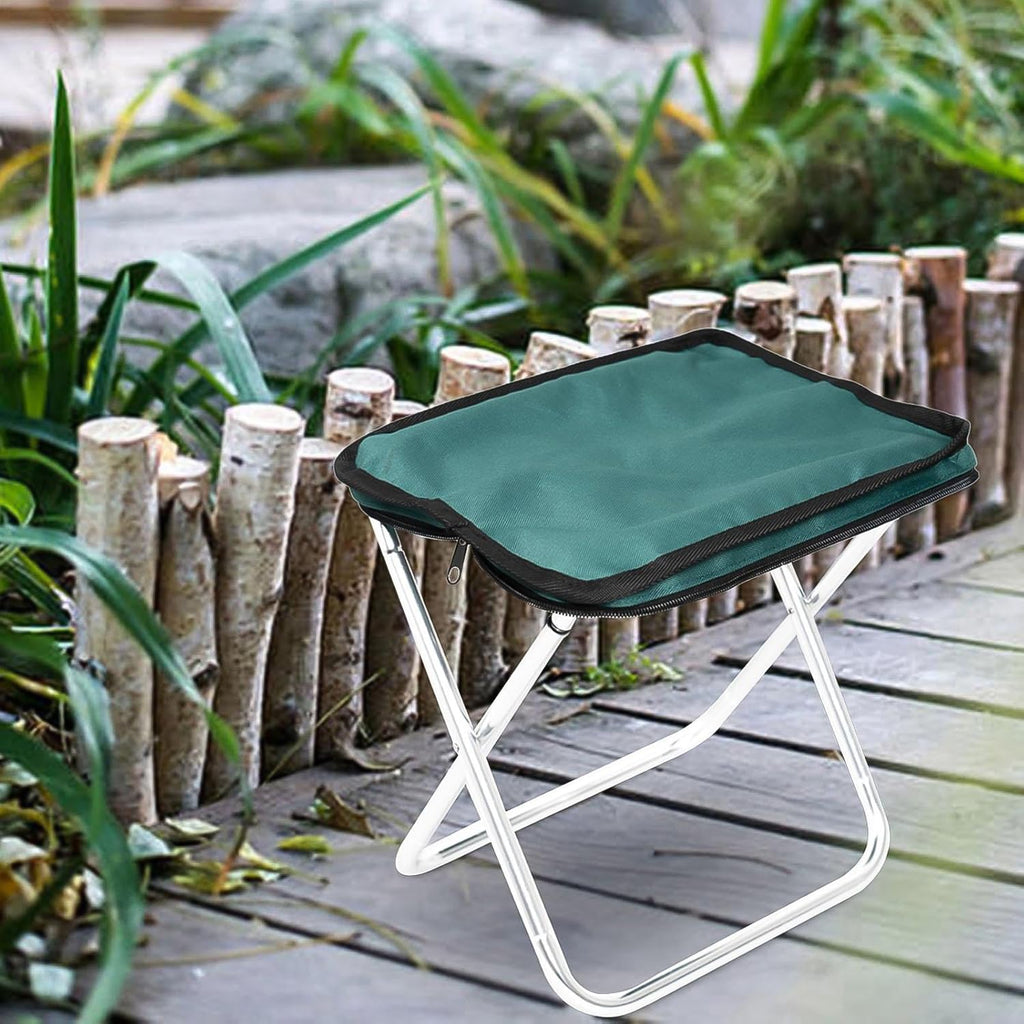 Lightweight Folding Camping Stool positioned beside a tent, showcasing outdoor readiness.