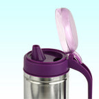 Close-up of anti-drip spout and ergonomic handle on stainless steel pourer