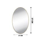 The elegant oval shape of the 3D mirror sticker on a neutral background.