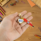 Acrylic and metal keychain with aura tag design