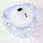 Warm flickering LED light emitted from heart-shaped flameless candles