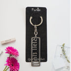 Stylish metal keychain showing Gujarati devotional script and key ring