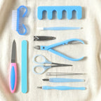 Manicure and pedicure grooming tool set with cleaning brush