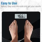 Person stepping on digital personal weight scale for precise weight measurement