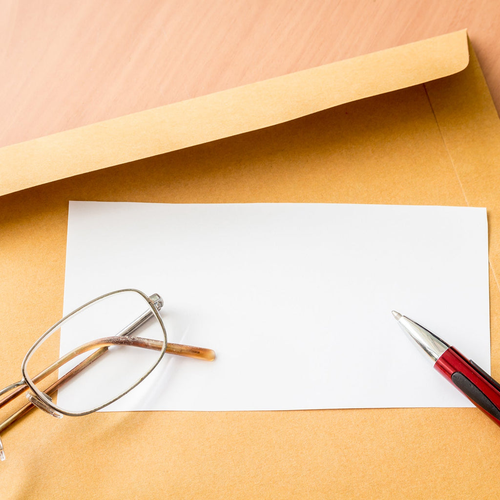 Detail of the strong self-adhesive strip on a self-seal kraft envelope.