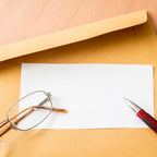 Detail of the strong self-adhesive strip on a self-seal kraft envelope.