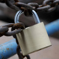 Safelix 38mm solid brass padlock with hardened steel shackle.
