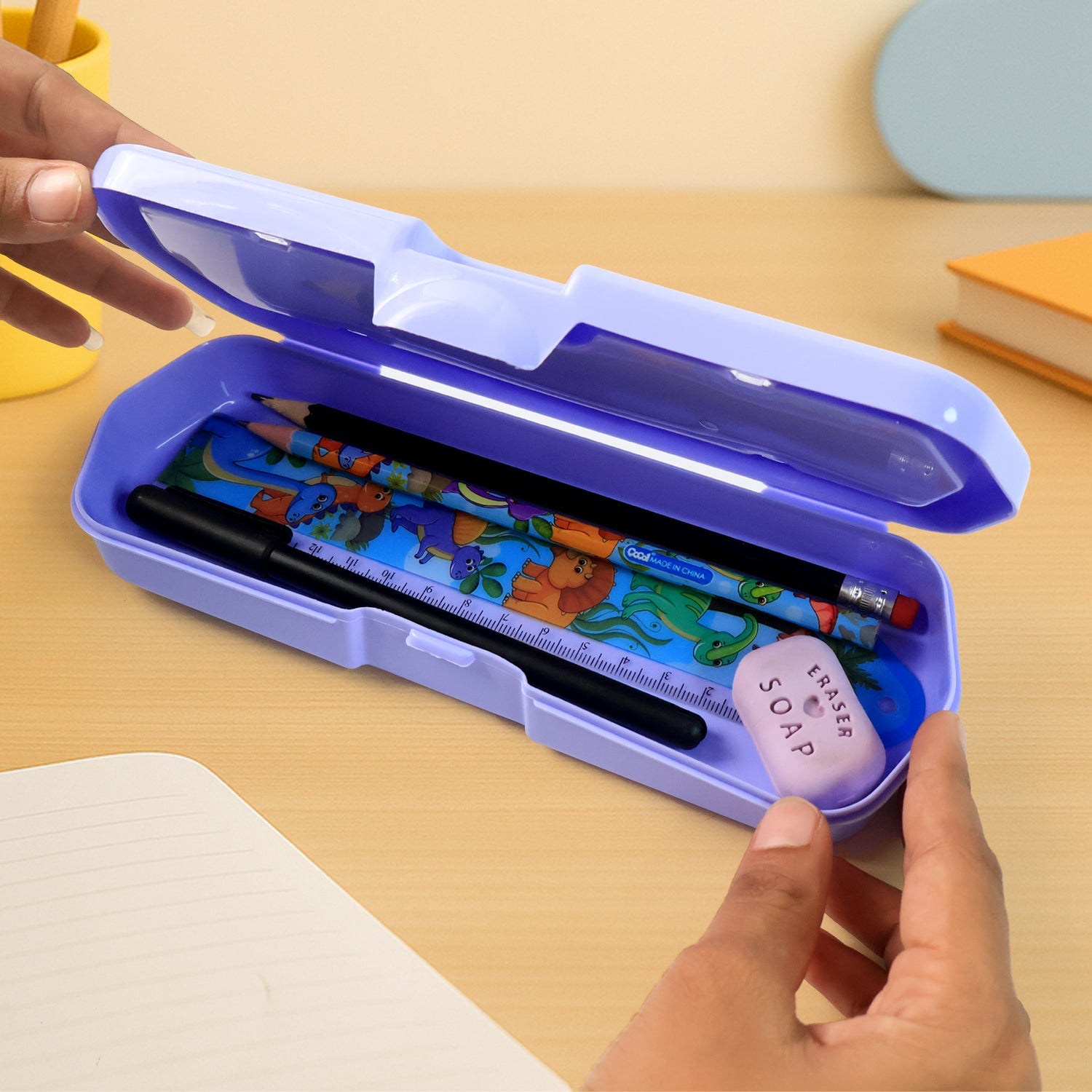 Angled view showing the secure snap-lock closure on the plastic Kids Pencil Box.
