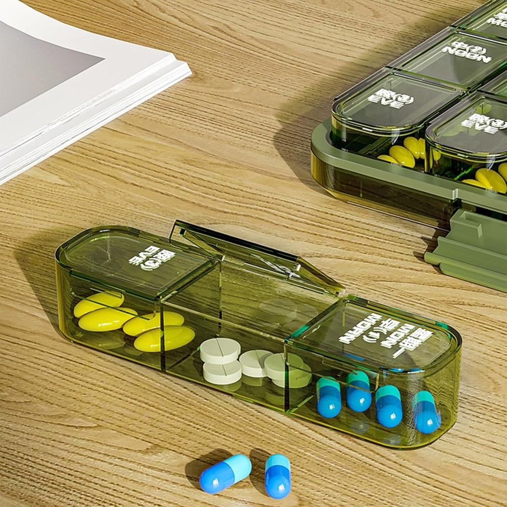 The weekly pill organiser held in hand, demonstrating its practical size for easy portability.