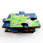 Kids engaging with the interactive educational world map puzzle on the floor.