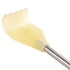 Back scratcher extended to 43 cm, shown next to a measuring tape for scale.