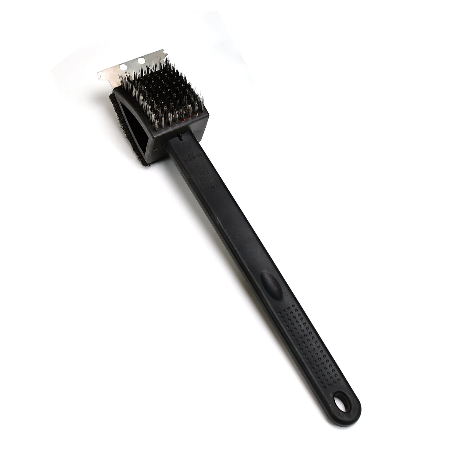 Black silicone toilet brush with its draining holder, ready for use in a modern bathroom.