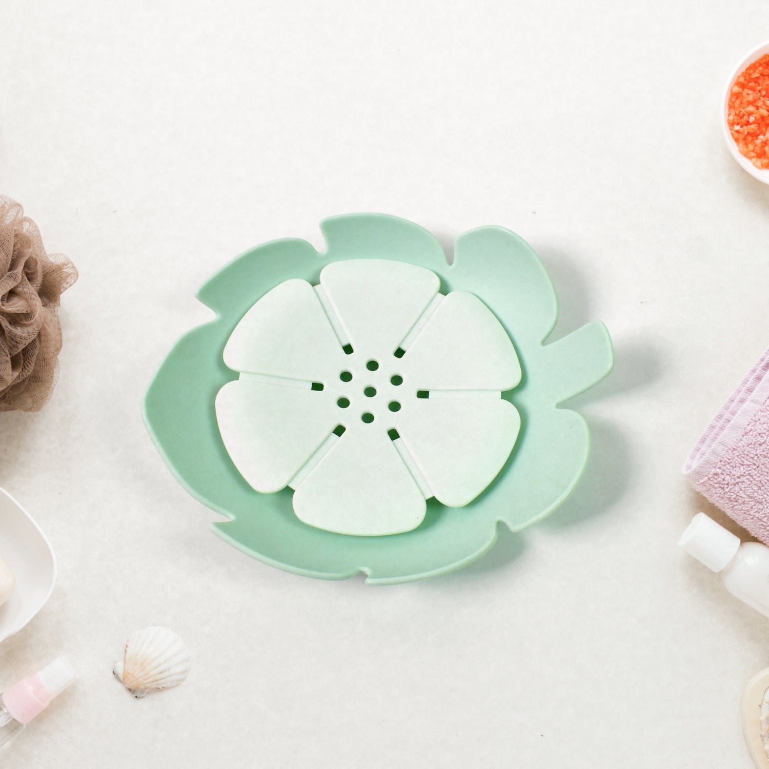 Side view of the lightweight plastic soap dish, perfect for bathroom or kitchen use.