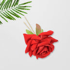Detail shot of the durable metal clip and soft red rose flower.