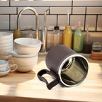 A blue Stainless Steel Coffee Mug with its lid securely placed, showing its travel-ready design.