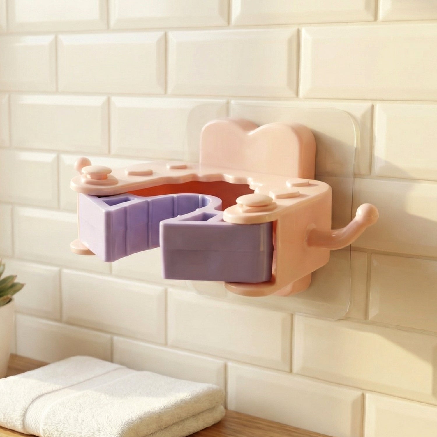 Installation of wall mounted holder clip demonstrated with adhesive