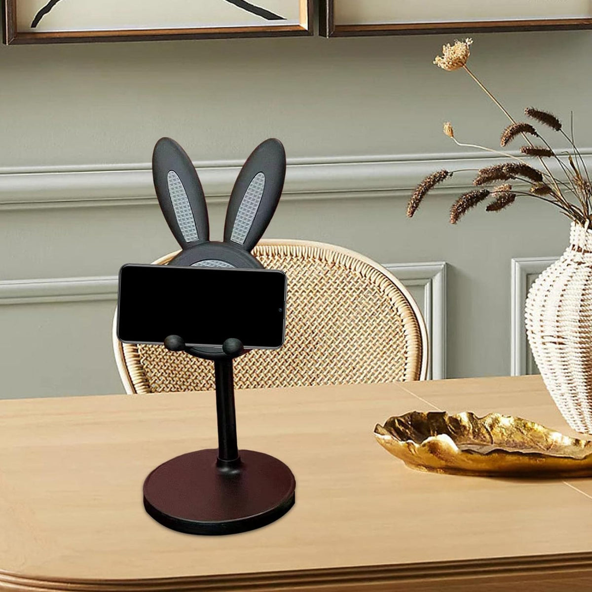 Adjustable Bunny Phone Stand on a desk, showcasing its cute design.
