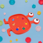 Multicolor Fu Fu Monster toy for kids, designed to stimulate young minds and fine motor skills.