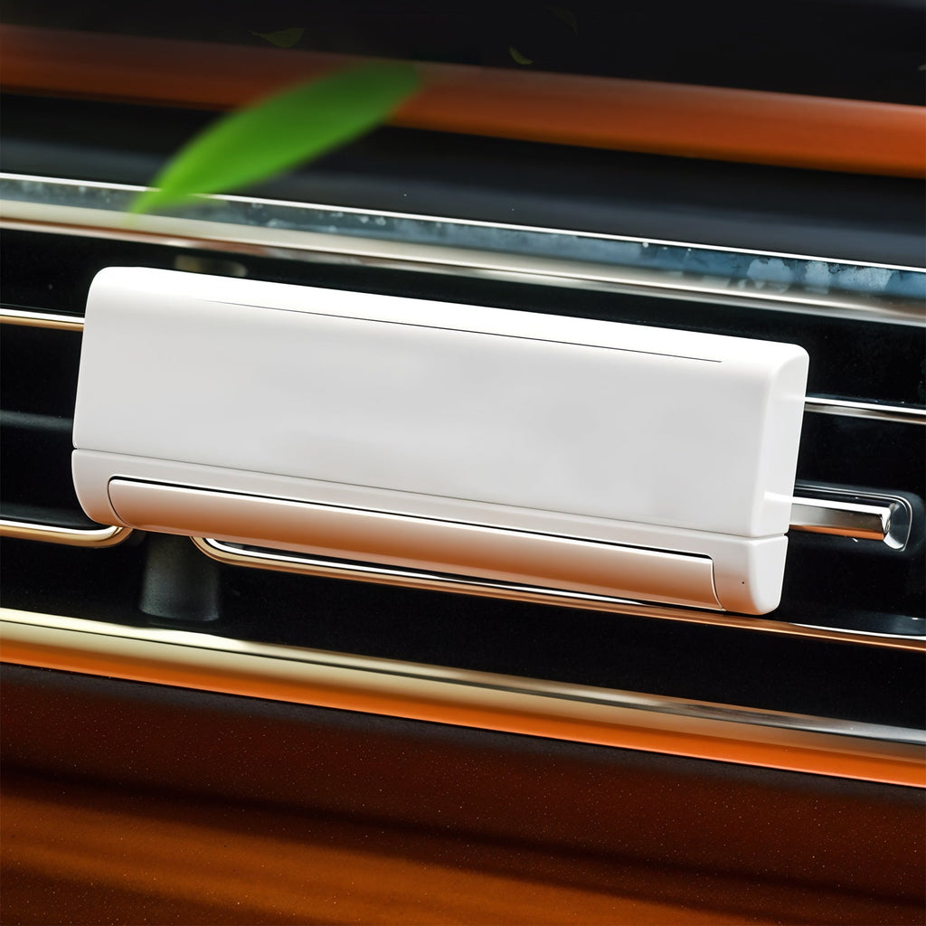 Car interior ambience with solar-powered air freshener releasing scent
