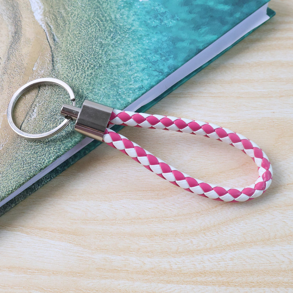 Hand strap loop detail of braided leather keychain enhancing portability