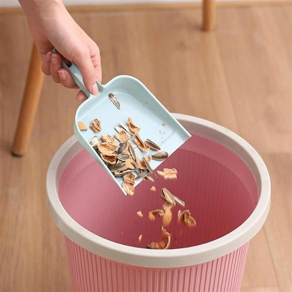 Durable plastic Mini Dustpan with Brush Set in a vibrant color.