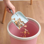 Durable plastic Mini Dustpan with Brush Set in a vibrant color.