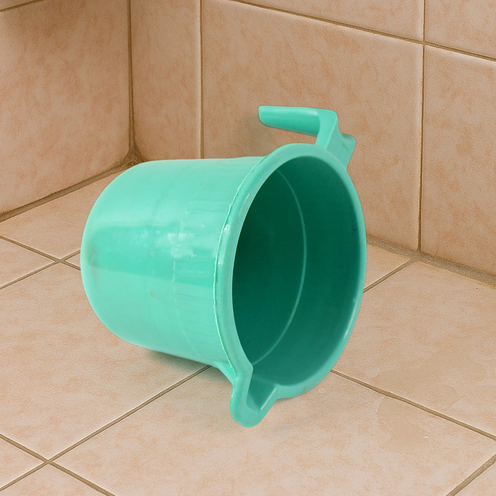 Side profile of plastic bath mug highlighting ergonomic handle