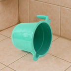 Side profile of plastic bath mug highlighting ergonomic handle