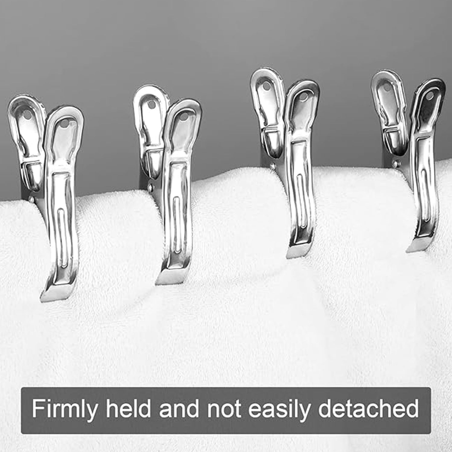 Windproof stainless steel laundry clips in use with blankets and quilts.