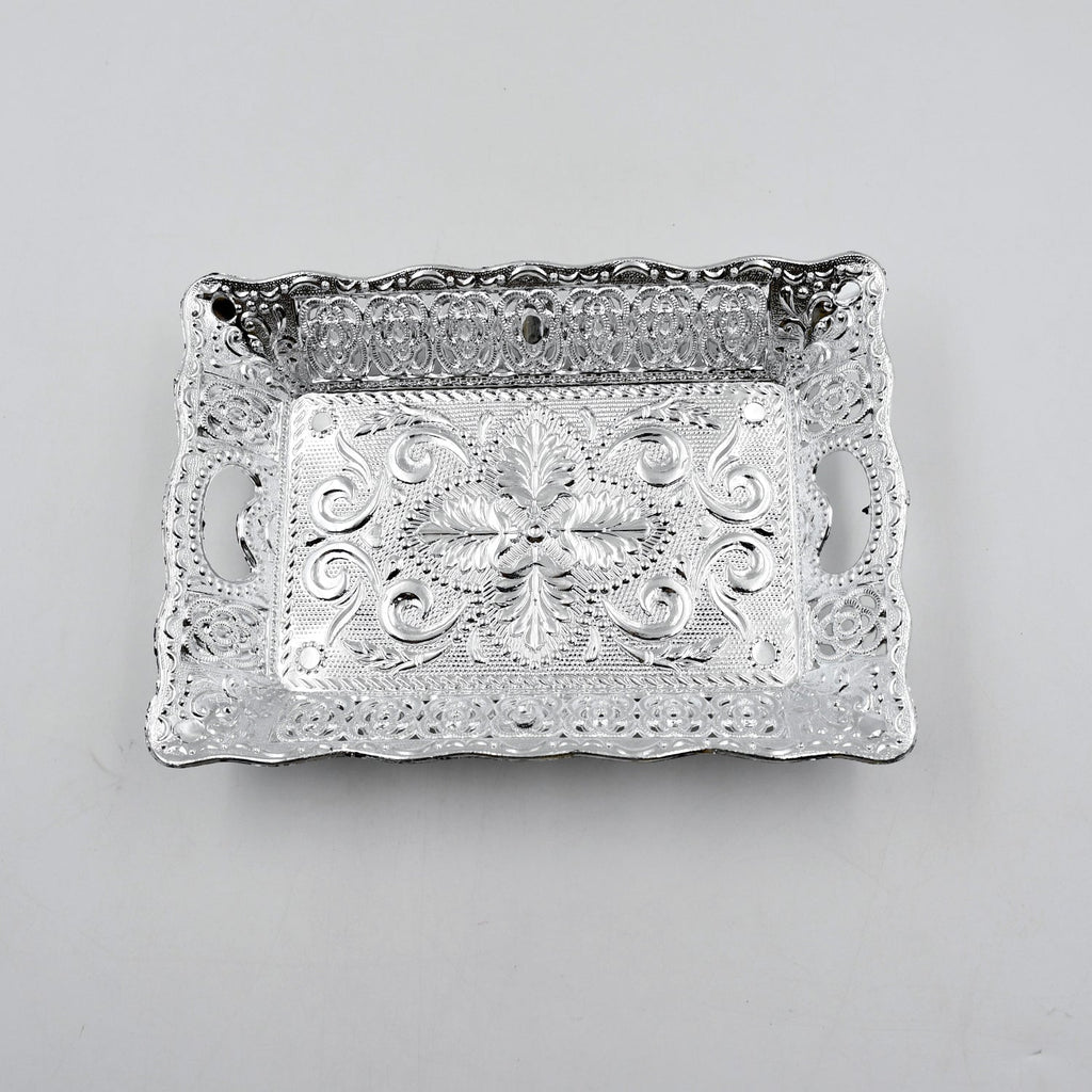 Decorative mukhwas serving tray beautifully arranged on a modern dining table.